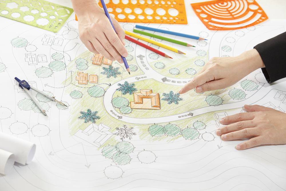 Landscape,Architect,Changing,Drawing,At,Meeting,With,Client